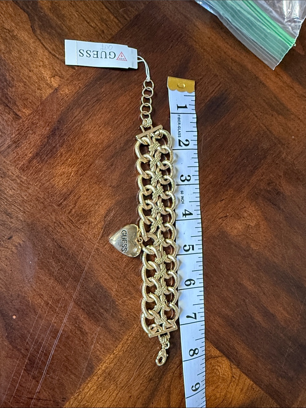 Guess Gold-Tone Chunky Chain Bracelet with Heart Charm